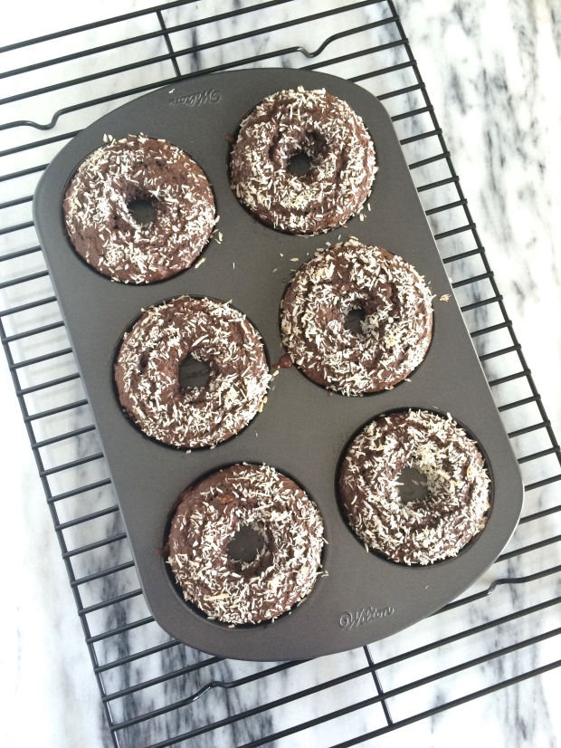 Chocolate Coconut Donuts are light, chocolatey and have just a hint of coconut. Better than from the donut shop, and they're baked too!